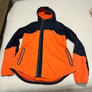 Vintage Lulu lemon running/windbreaker jacket size 10 orange and navy
